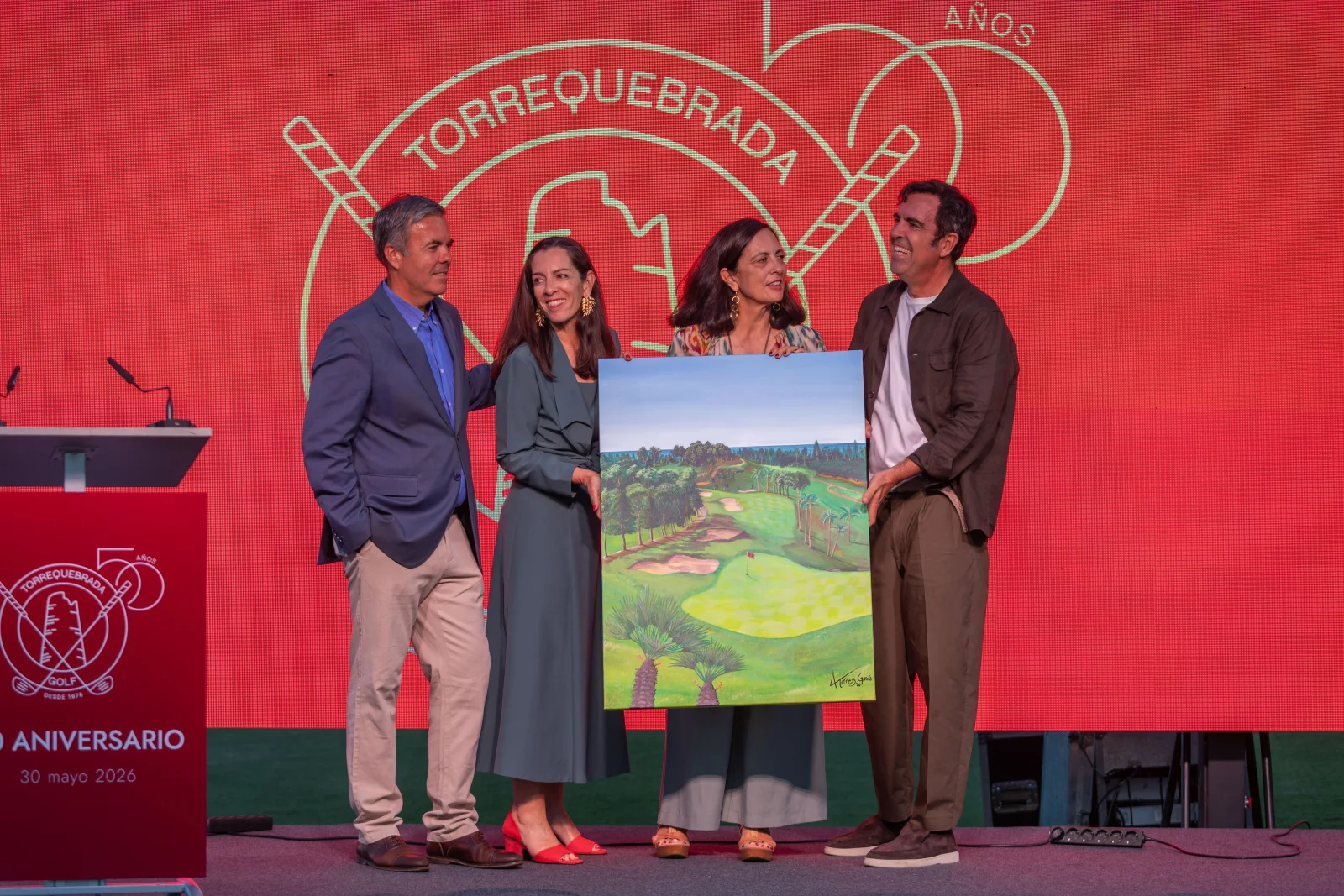 Presentation of a commemorative artwork on stage during the Golf Torrequebrada 50th anniversary gala in Benalmádena