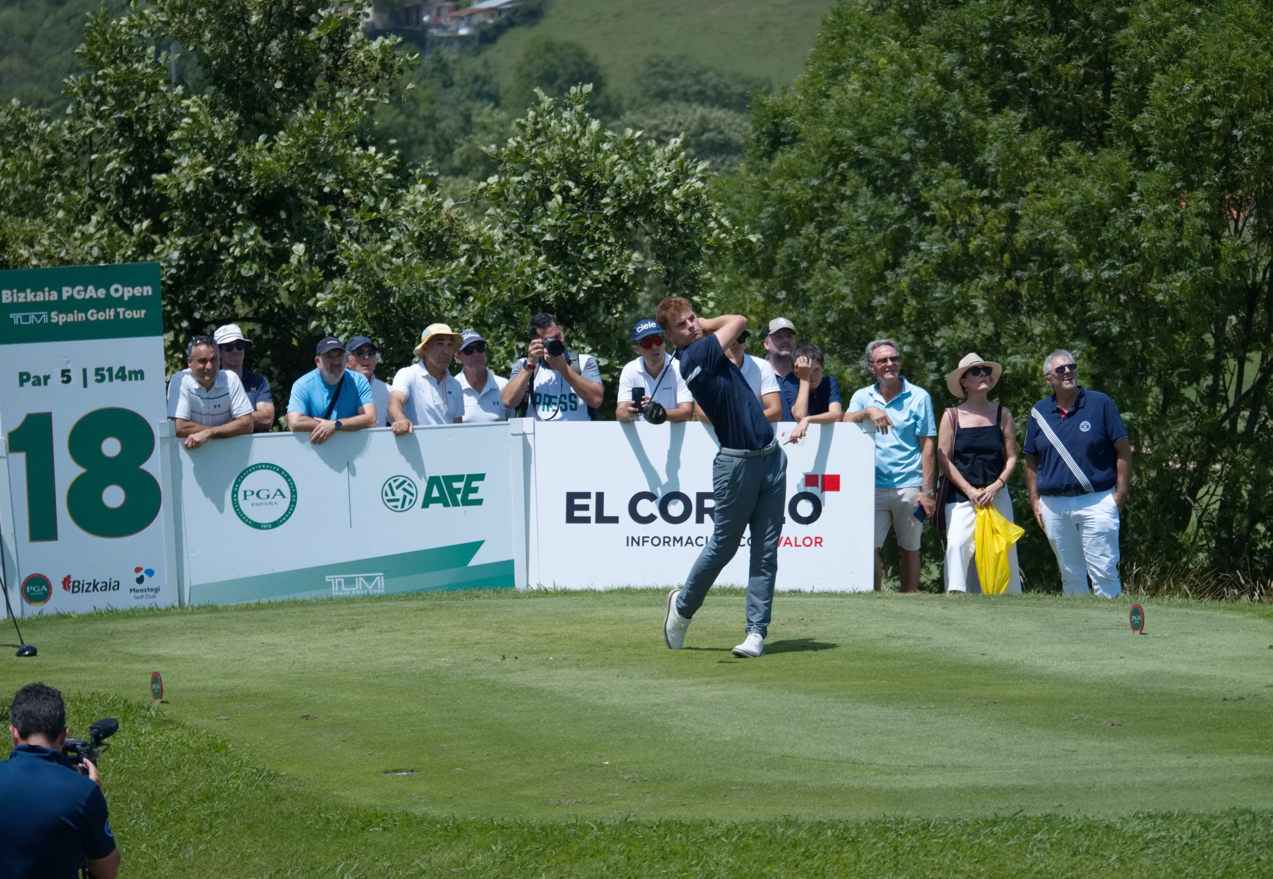 Tee shot at the par-5 18th hole at Meaztegi with the Bizkaia PGAe Open circuit sponsors' board